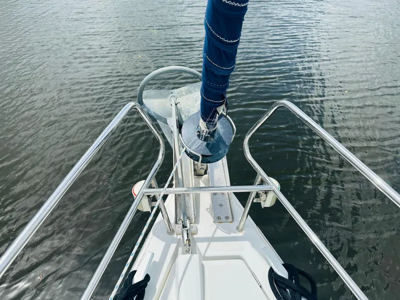 Slide: The Image of Bow view of 2015 Beneteau Oceanis 45 sailboat with anchor and railing. - 40