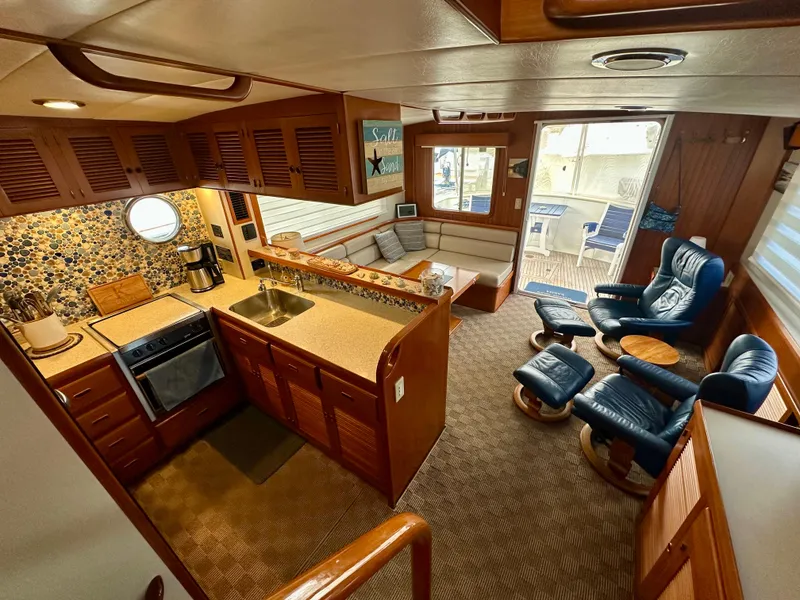 Slide: The Image of Kitchen area of 2008 Kadey-Krogen 44 yacht with sink and mosaic backsplash. - 23