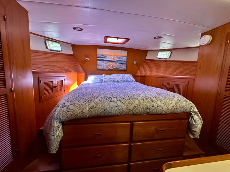 Slide: The Image of Luxurious 2008 Kadey-Krogen 44 yacht cabin with wooden interior and elegant furnishings. - 37