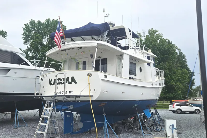 Slide: The Image of Luxurious interior of 2008 Kadey-Krogen 44 yacht with elegant wood finishes and comfortable seating. - 5