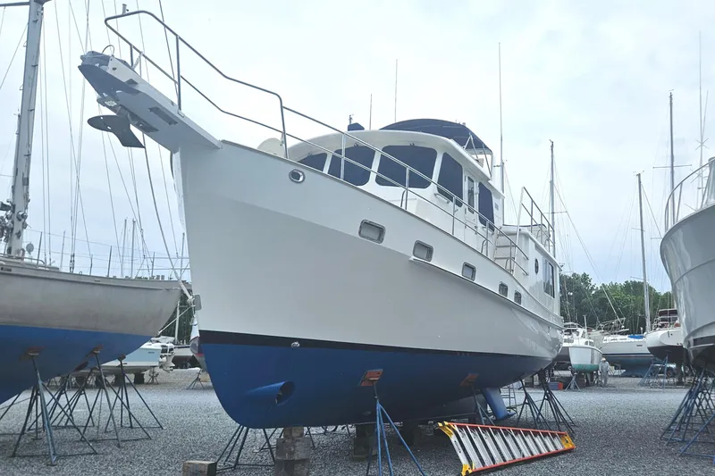 Slide: The Image of Luxurious interior of a 2008 Kadey-Krogen 44 yacht with elegant wood finishes and comfortable seating. - 6