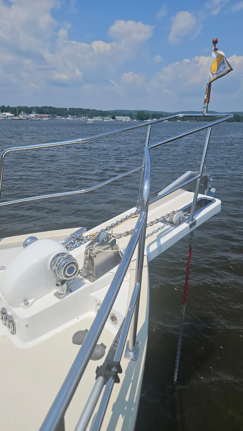 Slide: The Image of 2008 Kadey-Krogen 44 yacht with Highfield tender and Tohatsu outboard motor at marina. - 71