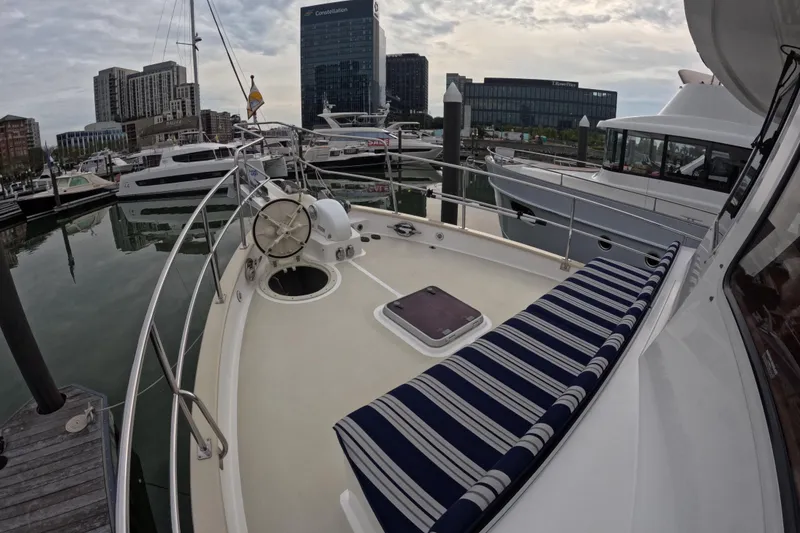 Slide: The Image of 2008 Kadey-Krogen 44 yacht on dry dock, surrounded by other boats. - 75