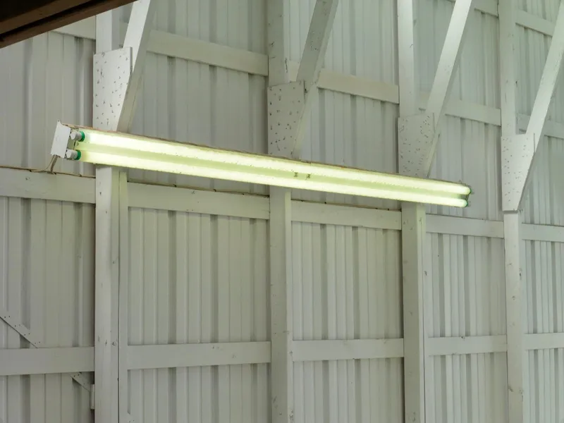 Slide: The Image of Fluorescent lights on white wooden wall in Boathouse #A138, 2012. - 5