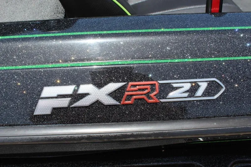 Slide: The Image of 2020 Skeeter FXR21 logo on glittery black surface with green accents. - 17