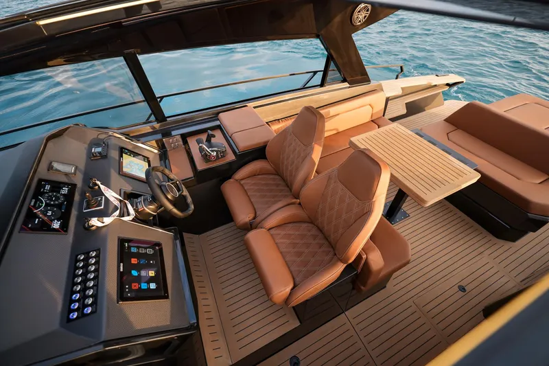 Slide: The Image of Luxurious 2025 Focus 3X yacht interior with leather seating and advanced navigation controls. - 11