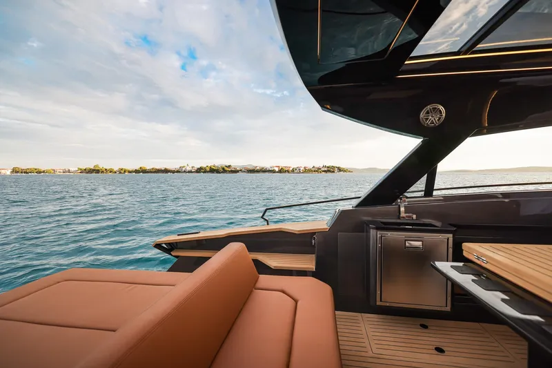 Slide: The Image of Luxurious 2025 Focus 3X yacht interior with scenic ocean view. - 17