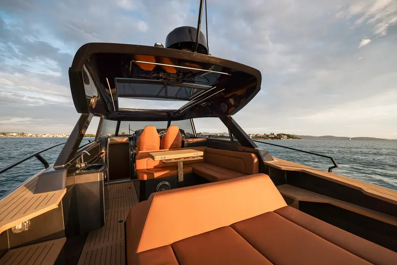 Slide: The Image of Luxurious 2025 Focus 3X yacht interior with sleek design and comfortable seating on open water. - 20