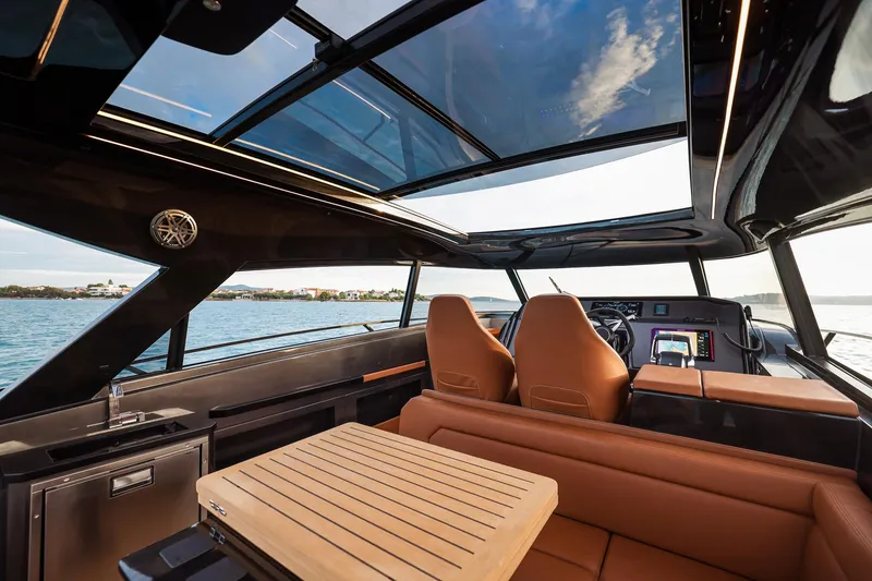 Slide: The Image of Luxurious interior of 2025 Focus 3X yacht with panoramic windows and modern seating. - 24