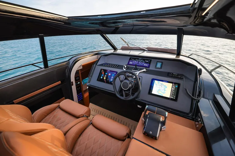 Slide: The Image of Luxurious 2025 Focus 3X yacht cockpit with advanced navigation systems and leather seating. - 25