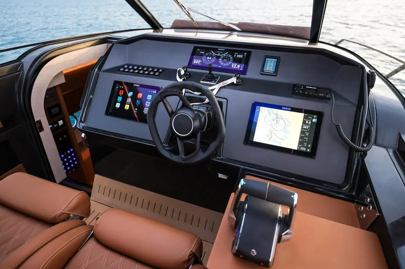 Slide: The Image of Luxurious 2025 Focus 3X yacht cockpit with advanced navigation and control systems. - 26
