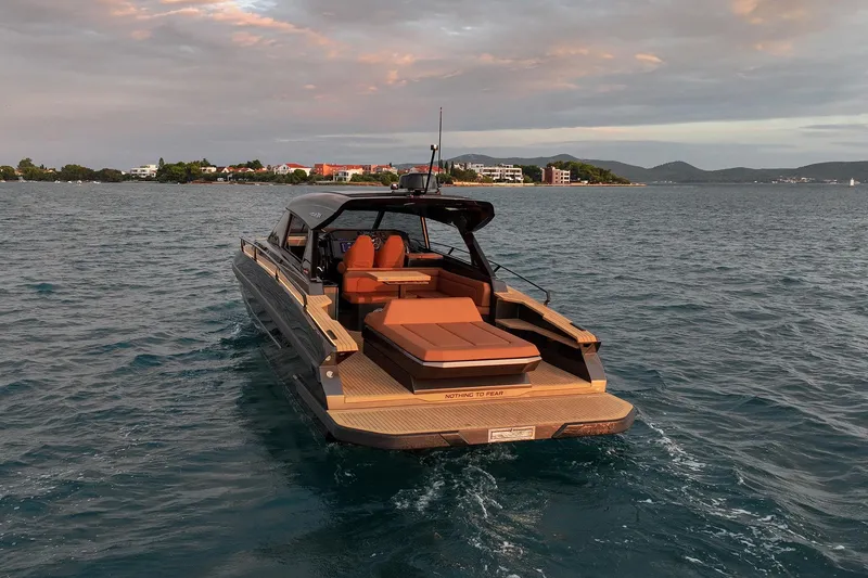 Slide: The Image of Luxury Focus 3X 2025 yacht cruising on serene waters at sunset. - 3