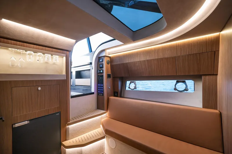 Slide: The Image of Luxurious interior of 2025 Focus 3X yacht with modern wood finishes and ambient lighting. - 30