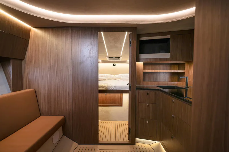 Slide: The Image of Luxurious interior of 2025 Focus 3X yacht with wood finish and modern lighting. - 34