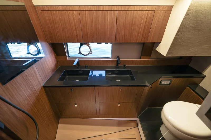 Slide: The Image of Luxurious bathroom interior in 2025 Focus 3X yacht with wood cabinetry and dual sinks. - 40