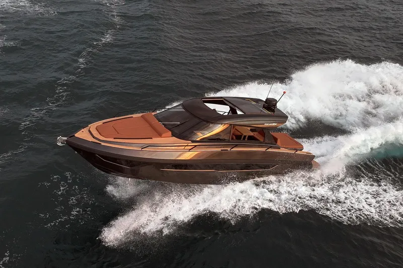 Slide: The Image of Luxurious 2025 Focus 3X yacht cruising swiftly on open water. - 5