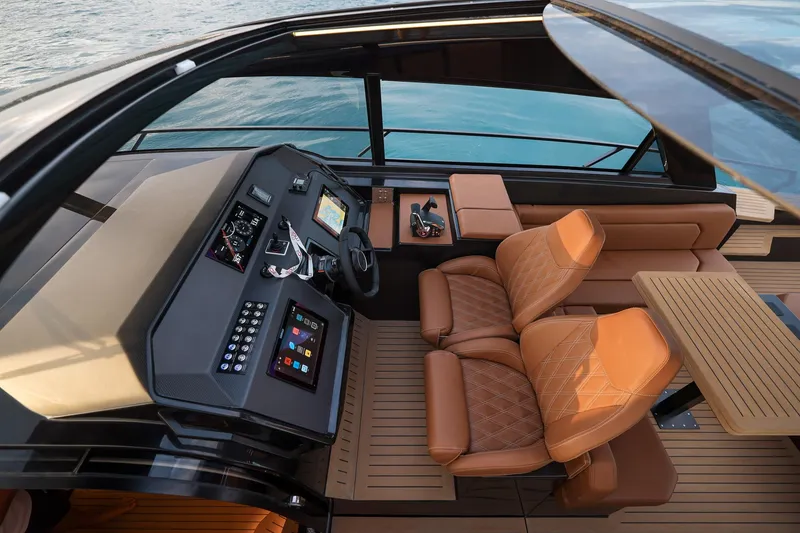 Slide: The Image of Luxurious 2025 Focus 3X yacht interior with leather seats and advanced navigation controls. - 9