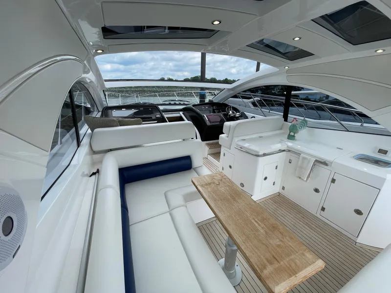 Slide: The Image of Luxurious interior of 2015 Sunseeker San Remo 48 yacht with sleek seating and modern amenities. - 21