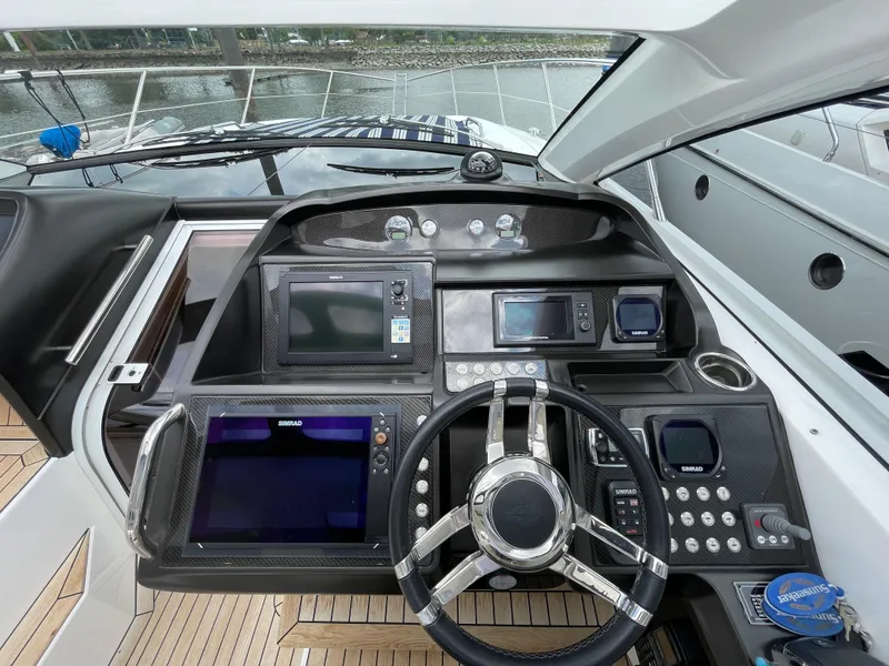 Slide: The Image of Cockpit of 2015 Sunseeker San Remo 48 yacht with advanced navigation systems. - 26