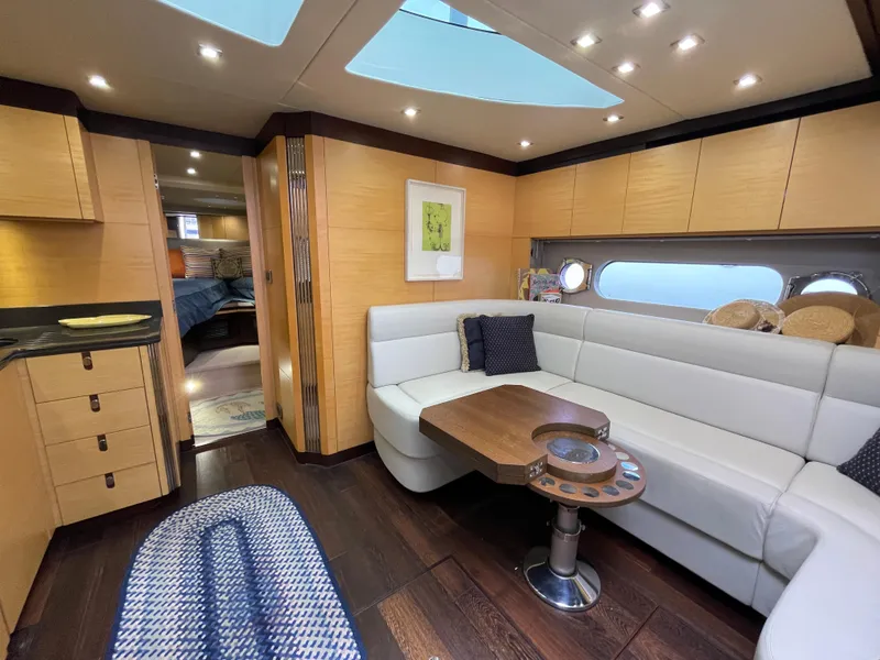 Slide: The Image of Luxurious interior of 2015 Sunseeker San Remo 48 yacht with modern seating and skylight. - 31