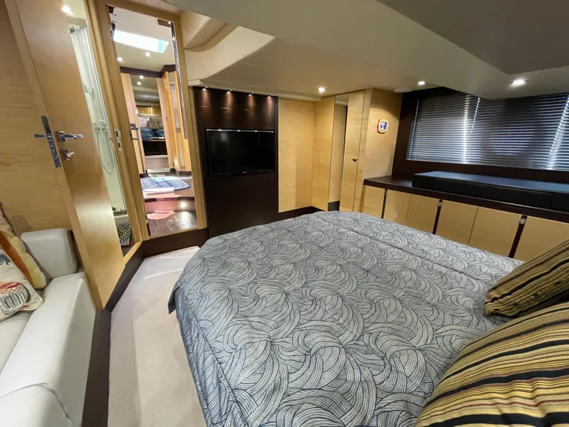 Slide: The Image of Luxurious interior of 2015 Sunseeker San Remo 48 yacht bedroom with modern decor. - 38