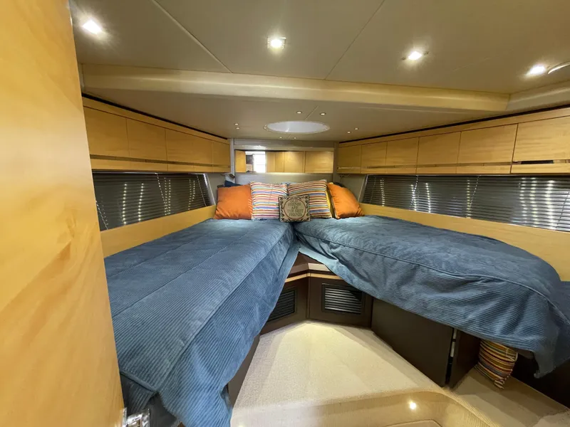 Slide: The Image of 2015 Sunseeker San Remo 48 interior cabin with twin beds and modern decor. - 40