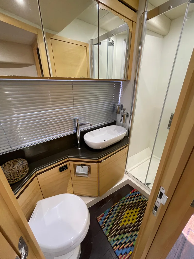 Slide: The Image of Luxurious bathroom in 2015 Sunseeker San Remo 48 yacht with modern fixtures and shower. - 41