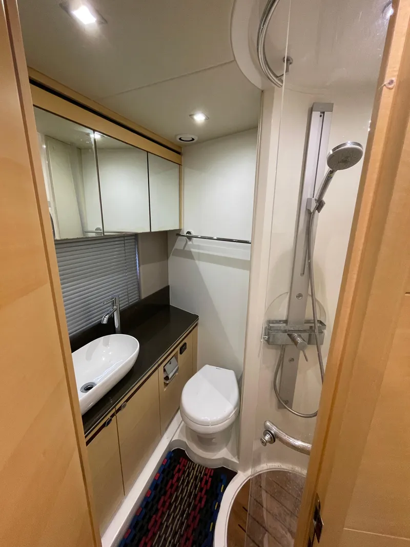 Slide: The Image of Luxurious bathroom in 2015 Sunseeker San Remo 48 yacht with modern fixtures and shower. - 42