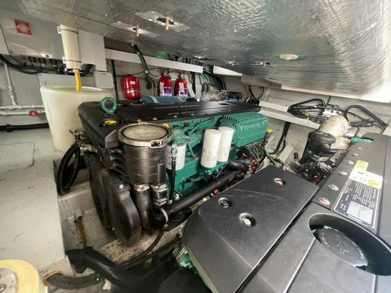 Slide: The Image of Engine room of 2015 Sunseeker San Remo 48 yacht, showcasing machinery and components. - 46