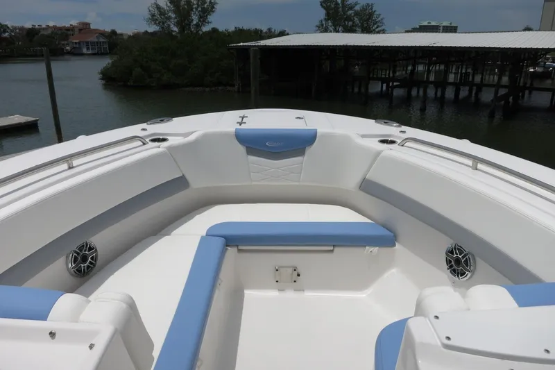 Slide: The Image of 2025 Robalo R317 Dual Console boat with spacious seating and sleek design. - 14