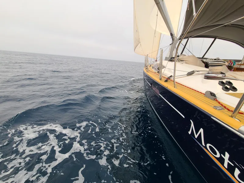 Slide: The Image of Jeanneau 57 sailboat cruising on open sea, 2013 model. - 8