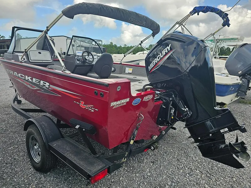 Slide: The Image of 2022 Tracker Pro Guide V-175 WT boat with Mercury engine on trailer. - 3