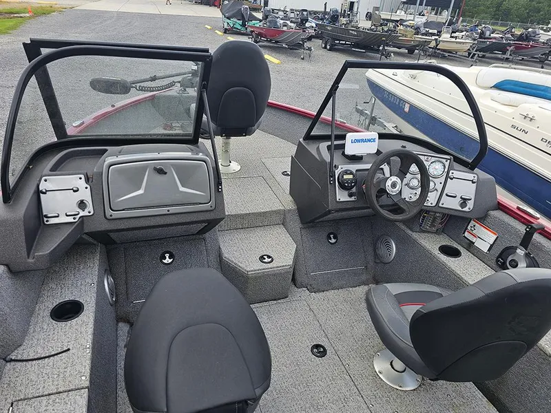 Slide: The Image of 2022 Tracker Pro Guide V-175 WT boat interior with steering console and seating. - 7