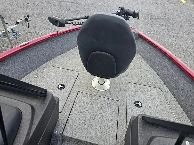 Slide: The Image of 2022 Tracker Pro Guide V-175 WT boat interior with seat and storage compartments. - 8