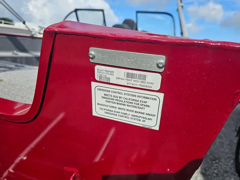 Slide: The Image of Red 2022 Tracker Pro Guide V-175 WT boat with emissions control information plate. - 9