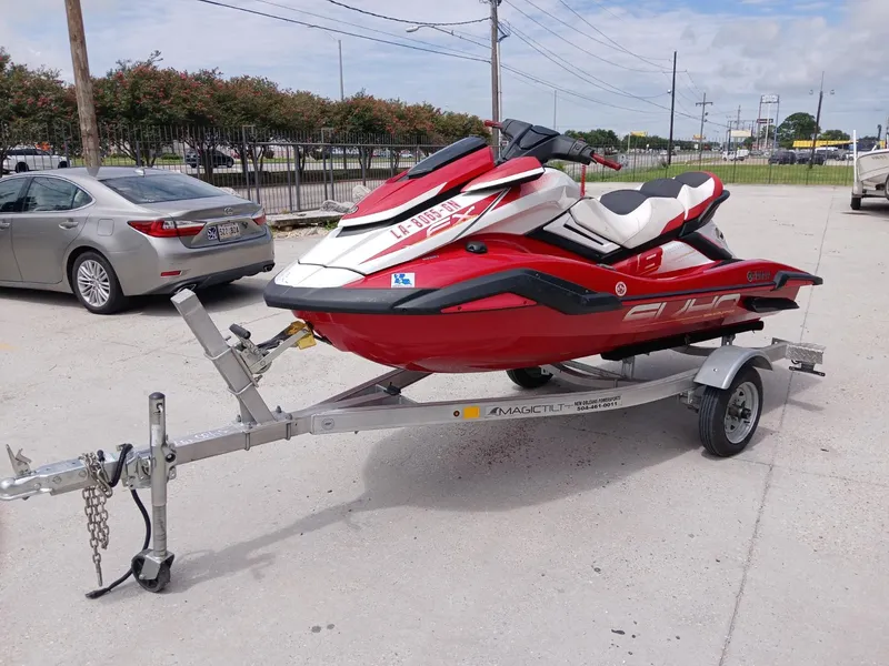 Slide: The Image of 2021 Yamaha WaveRunner FX SVHO on trailer, parked outdoors. - 2