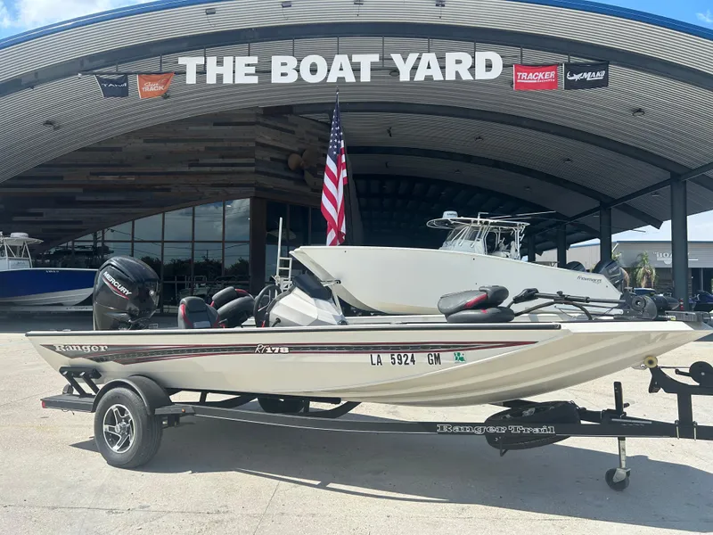 Slide: The Image of 2021 Ranger RT178C boat on trailer at The Boat Yard dealership. - 0