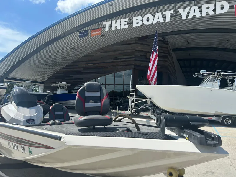 Slide: The Image of 2021 Ranger RT178C boat displayed at The Boat Yard with American flag. - 8