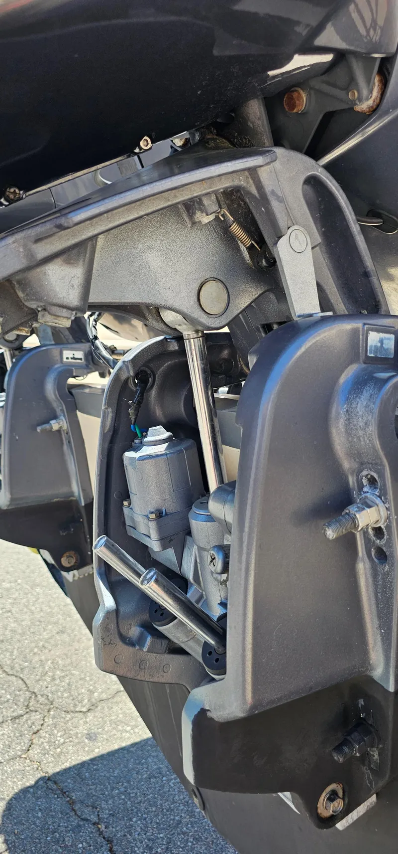 Slide: The Image of Close-up of a 2011 Grady-White Freedom 275 boat engine components. - 17