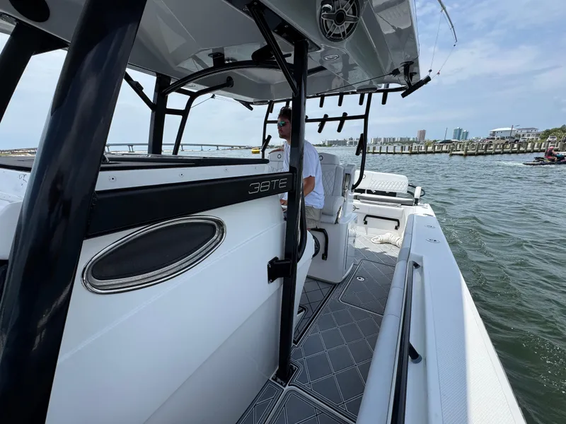 Slide: The Image of 2021 Fountain 38TE boat on water, featuring sleek design and modern amenities. - 28
