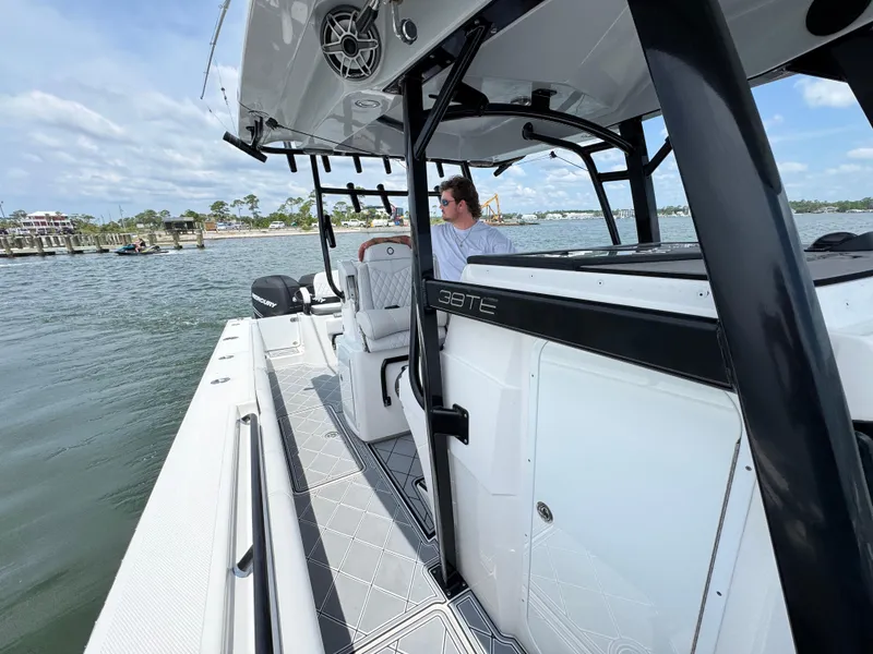 Slide: The Image of 2021 Fountain 38TE boat on water, featuring sleek design and modern amenities. - 29