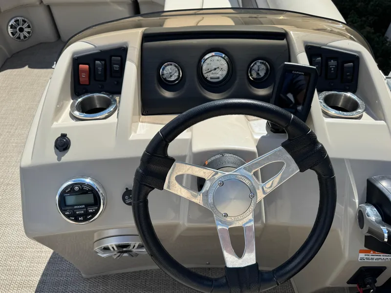 Slide: The Image of Steering console of 2019 Bennington SX 21 SSRCX boat with gauges and controls. - 14