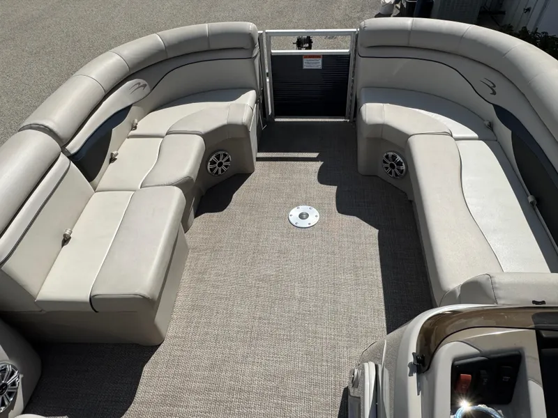 Slide: The Image of 2019 Bennington SX 21 SSRCX pontoon boat interior with spacious seating and modern design. - 9