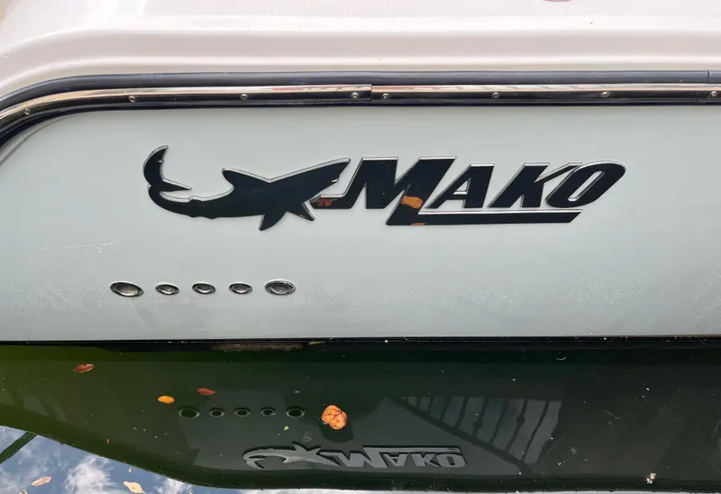 Slide: The Image of 2017 Mako 414 CC Bluewater Family Edition boat logo on hull. - 122