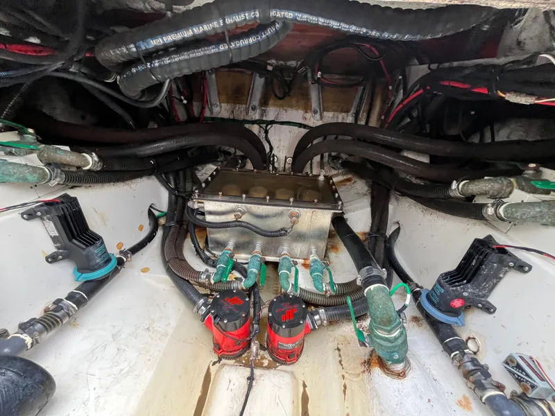 Slide: The Image of Engine compartment of a 2017 Mako 414 CC Bluewater Family Edition boat. - 23