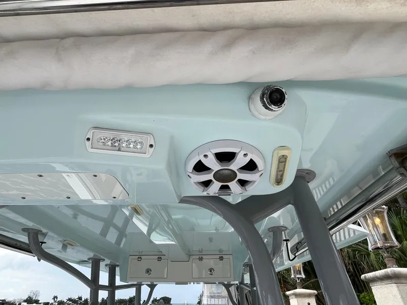 Slide: The Image of 2017 Mako 414 CC Bluewater boat interior with speaker and light fixtures. - 31