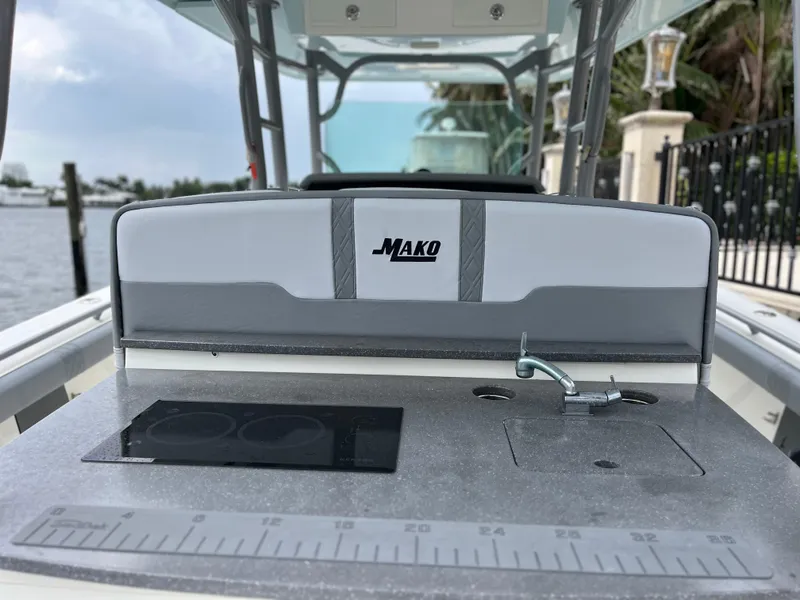 Slide: The Image of 2017 Mako 414 CC Bluewater Family Edition boat interior with fishing station and sink. - 32