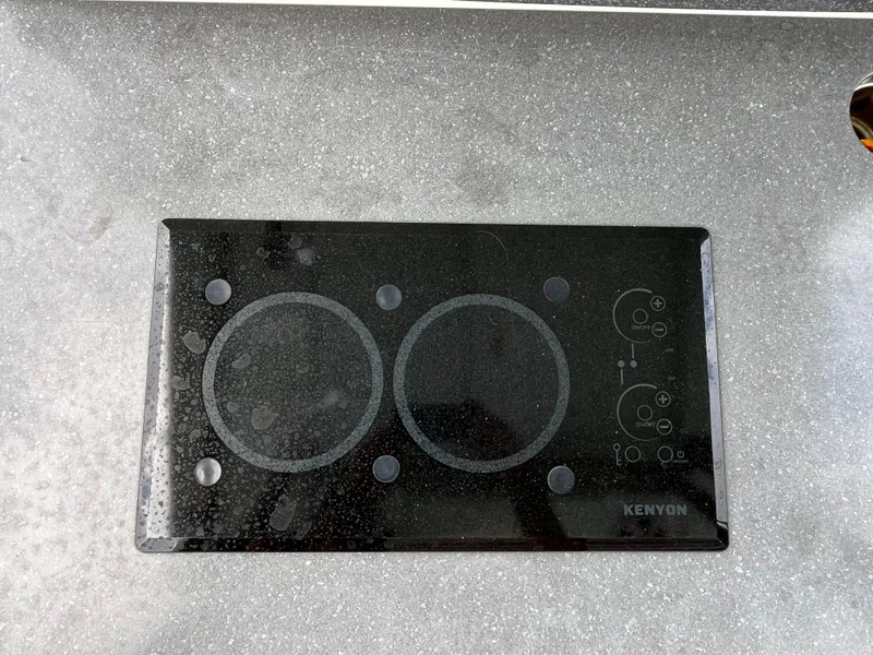 Slide: The Image of Kenyon electric cooktop on Mako 414 CC Bluewater Family Edition, 2017 model. - 33