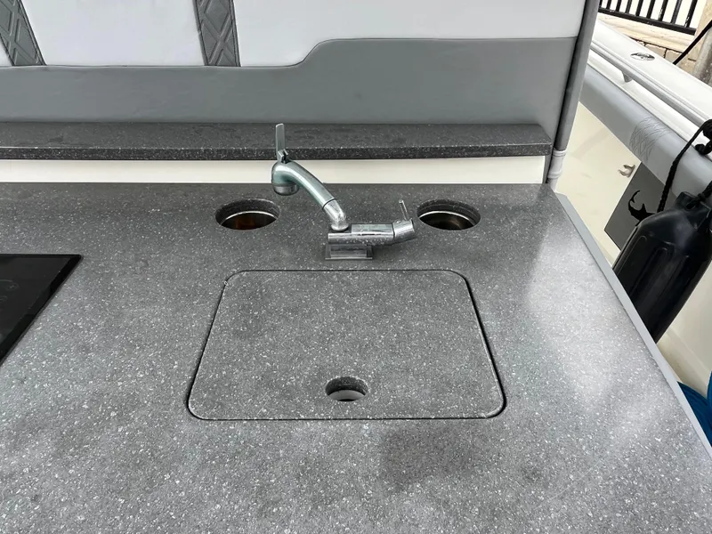 Slide: The Image of 2017 Mako 414 CC Bluewater Family Edition boat sink and countertop detail. - 34