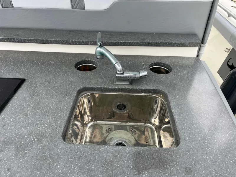 Slide: The Image of Stainless steel sink and faucet on Mako 414 CC Bluewater Family Edition boat, 2017 model. - 35